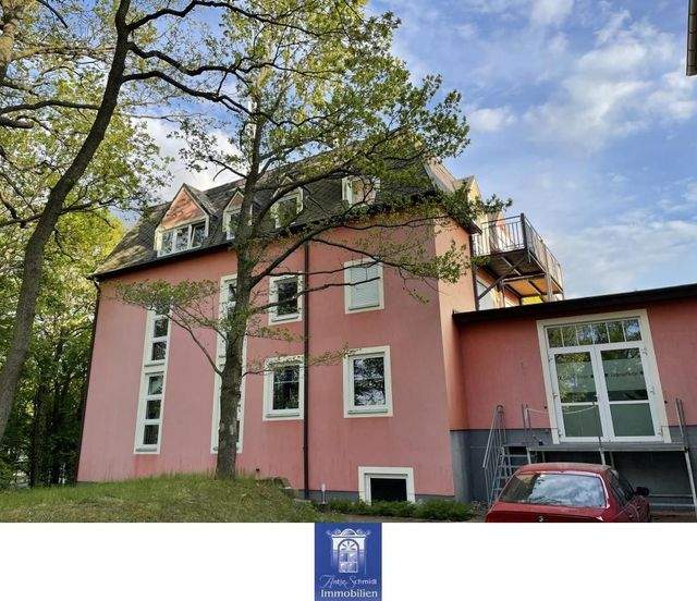 Hübsche Wohnung mit großer Terrasse in grüner und ruhiger Lage! - Foto 4