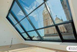 Raumhohe Schrägfenster auf der Wohnebene