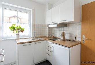 Küche; KI: Raum leergeräumt