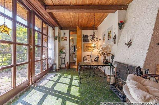 Terrassenzimmer mit Kamin