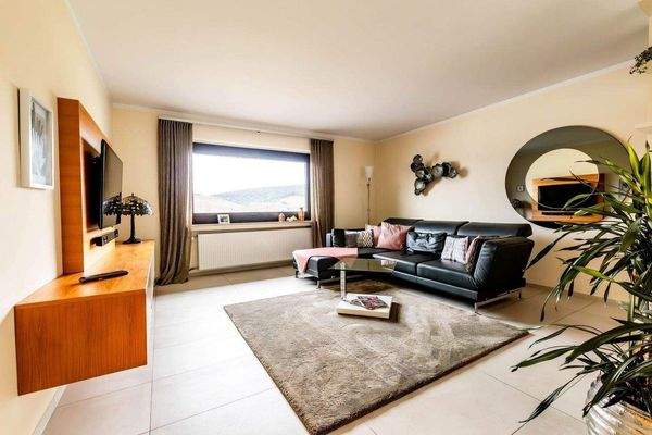 Wohn/Esszimmer mit Kaminofen Bild 2