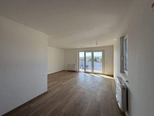 Haus_1_Top_16_Küche_mit_Blick_auf_Wohnbereich