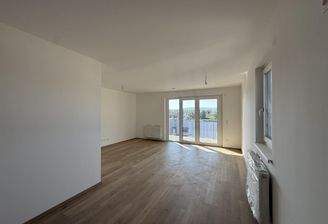 Haus_1_Top_16_Küche_mit_Blick_auf_Wohnbereich