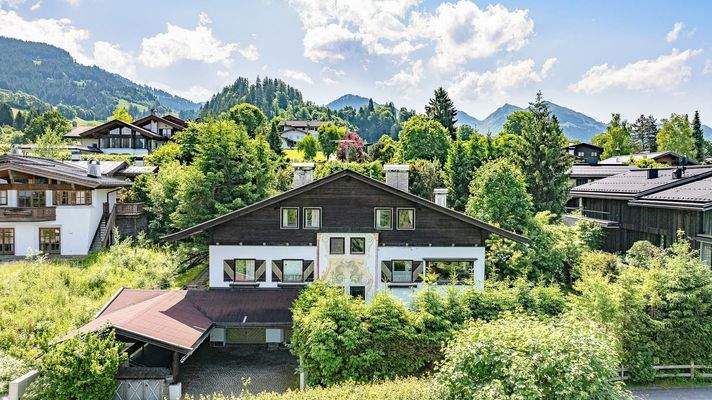 KITZIMMO-Baugrundstück mit Altbestand in Toplage auf der Bichlalm - Immobilien Kitzbühel.