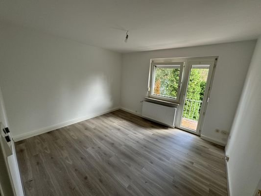 Wohnzimmer mit Balkon