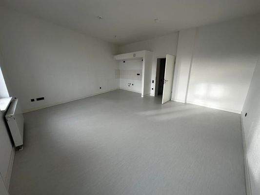 Wohnzimmer mit Kochnische