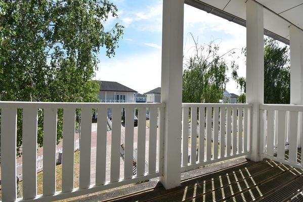 ferienwohnung-schlafzimmer-cap-helius-balcony-zugang-boxspring10