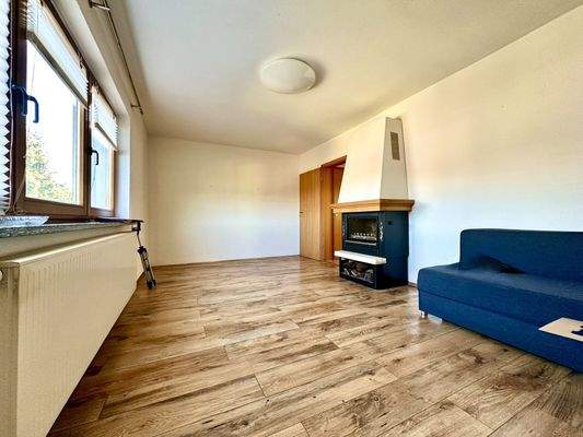 Wohnzimmer mit Kamin