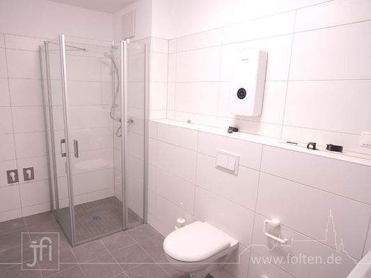 Bad mit bodengleicher Dusche