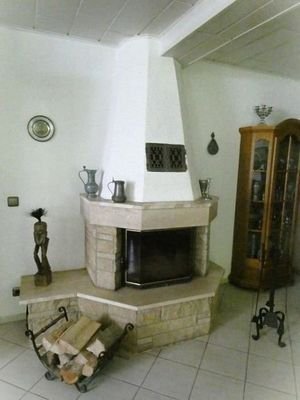 EG: Wohnzimmer mit Kamin