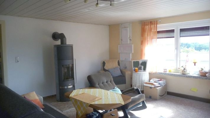 Wohnzimmer mit Kamin OG