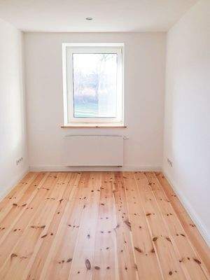 Zimmerbeispiel mit Dielenboden