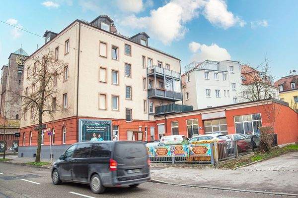 MFH mit 14 Whg. und 2 Gewerbeeinheiten