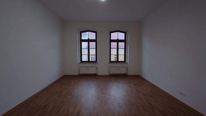 Wohnzimmer mit Holzboden