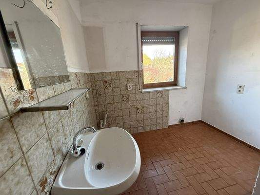 Waschküche im EG (änderbar, z. B. Büro))