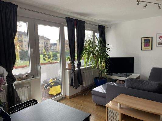 Wohnzimmer mit Zugang zur...