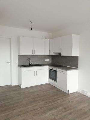 Moderne Küche mit Holzboden