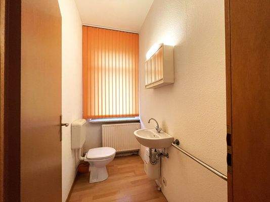 WC zugehörig zum Laden