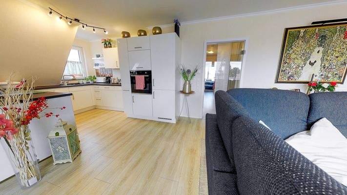 Wohnzimmer mit Küchenansicht