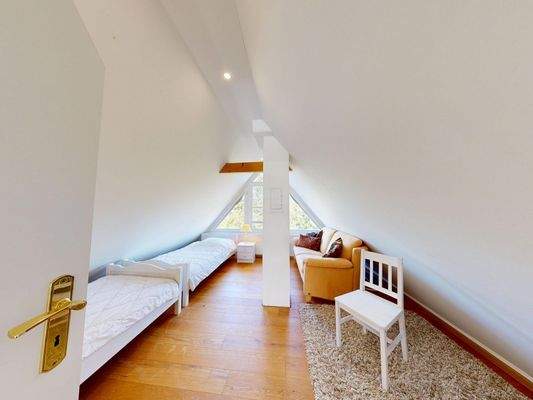 Schlafzimmer im Spitzboden -  Wohnung 4