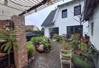 Terrassenblick zum Haus