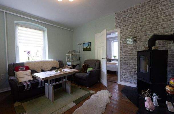 Wohnzimmer mit Kamin