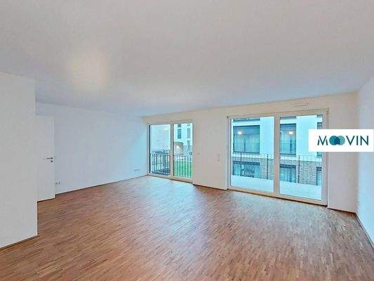 Ansicht I: Wohn- und Esszimmer mit offenem Küchenbereich