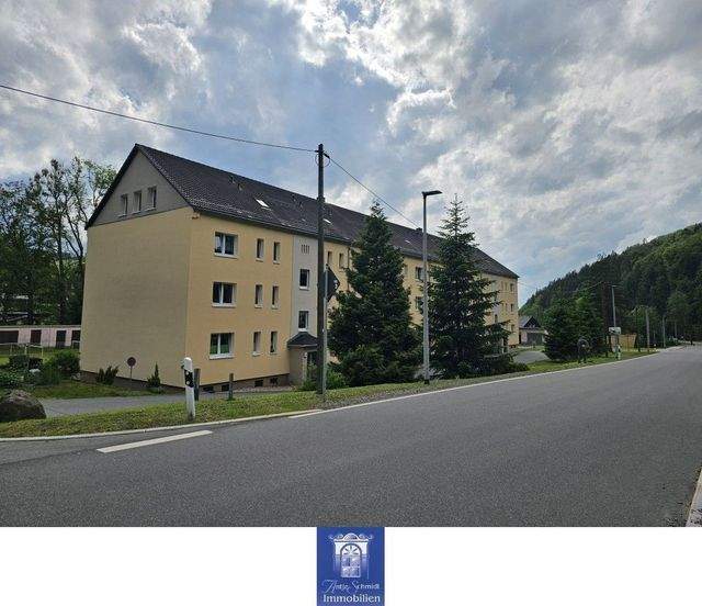 Zauberhafte Wohnung mit schönem Balkon in herrlicher grüner Umgebung! - Foto 1