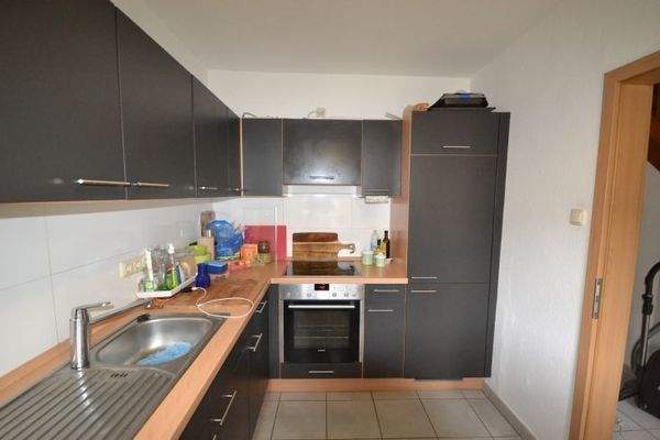 Küche mit Einbauküche