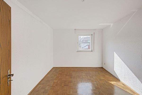 Eines der Schlafzimmer im Dachgeschoss