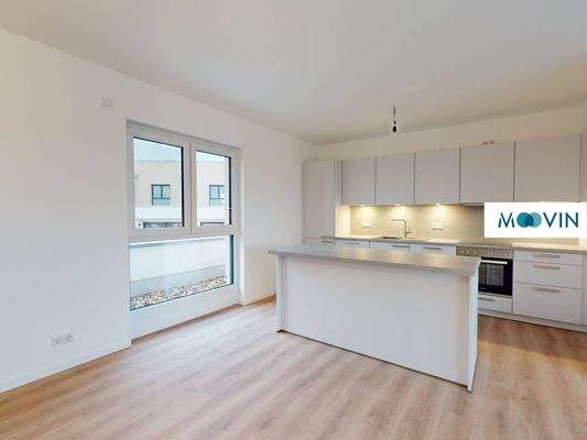 Blick in die Küche mit Kücheninsel