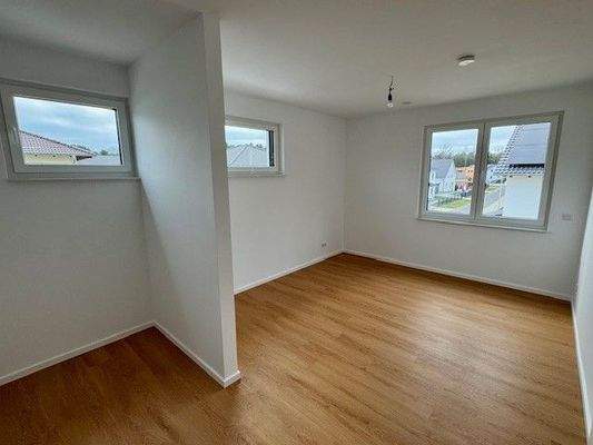 Schlafzimmer mit Ankleidebereich