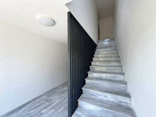 Treppe zum Staffelgeschoss