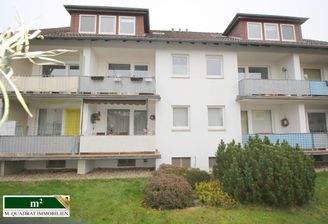 Gartenblick auf MFH mit Loggien u. 2 Erkern