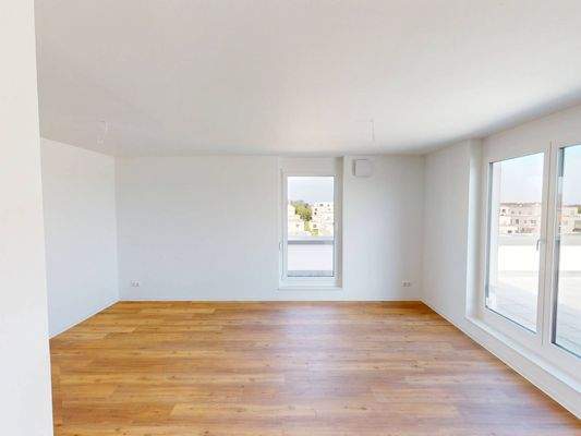 Ansicht I: Wohn- und Esszimmer mit offenem Küchenbereich