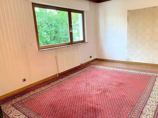 Blick in den hinteren Garten vom Wohnzimmer.jpeg