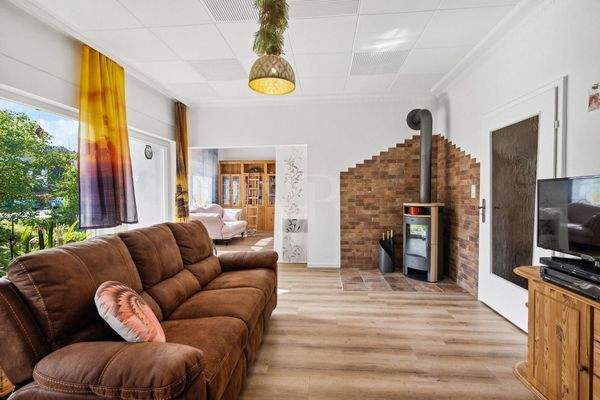 Wohnzimmer mit Kamin