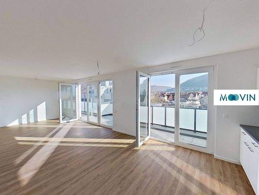 Ansicht III: Wohn- und Esszimmer mit offenem Küchenbereich