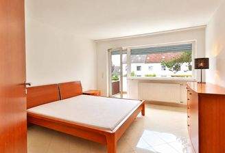Schlafzimmer mit Balkonzugang