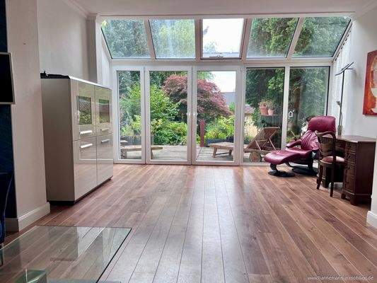 Wohnzimmer mit Wintergarten
