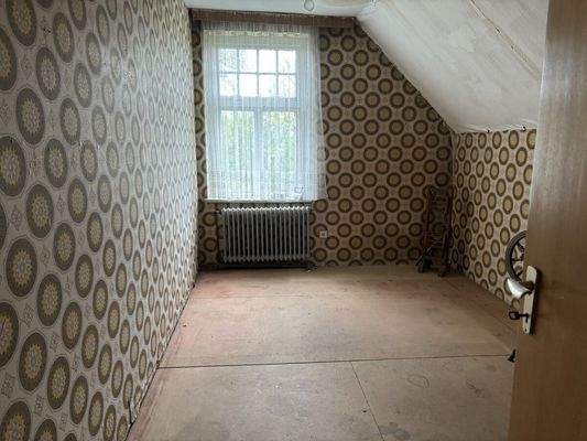 einfaches Zimmer im OG