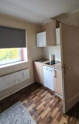 DG: Holzofen im Wohnzimmer