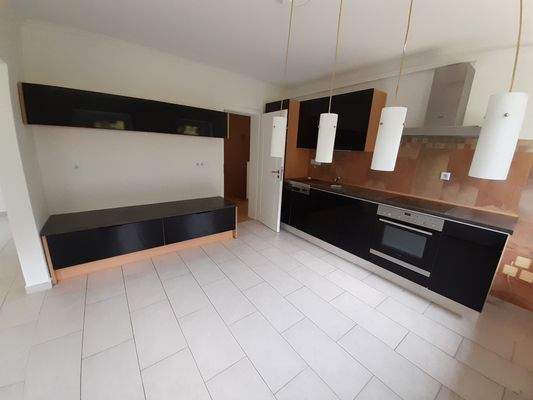 Offener Wohnbreich mit Einbauküche