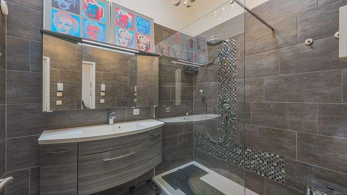 KITZIMMO-exklusive Dachgeschosswohnung kaufen - Immobilien Kitzbühel.