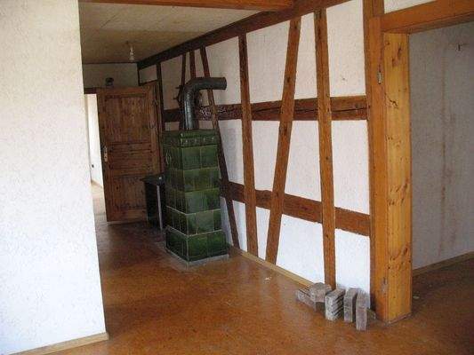 Flur mit Kachelofen - Wohnung
