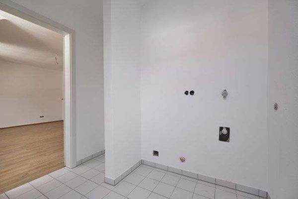 Abstellraum mit Waschmaschinenanschluss