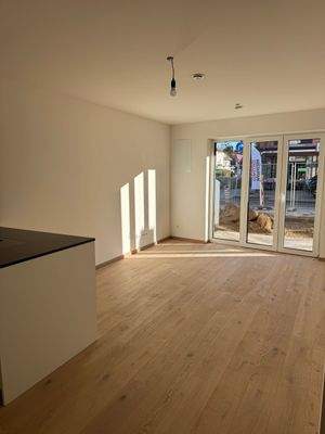 Wohn- &amp; Essbereich mit Blick zum Garten