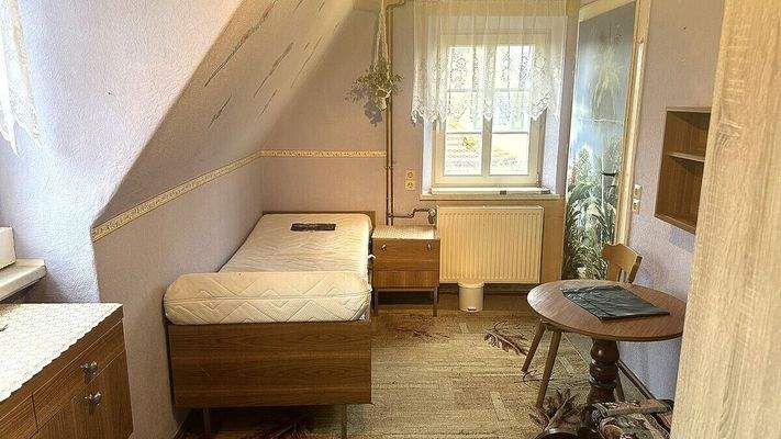 1.OG Schlafzimmer 1