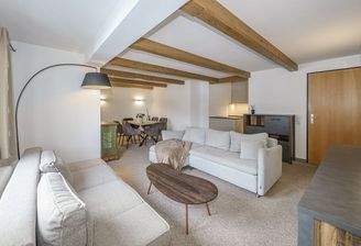 KITZIMMO-Dachgeschosswohnung mit Lift & Garage mieten - Immobilien Kitzbühel.