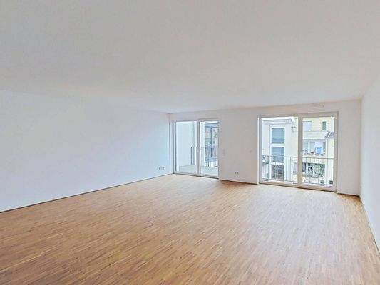 Ansicht V: Wohn- und Esszimmer mit offenem Küchenbereich